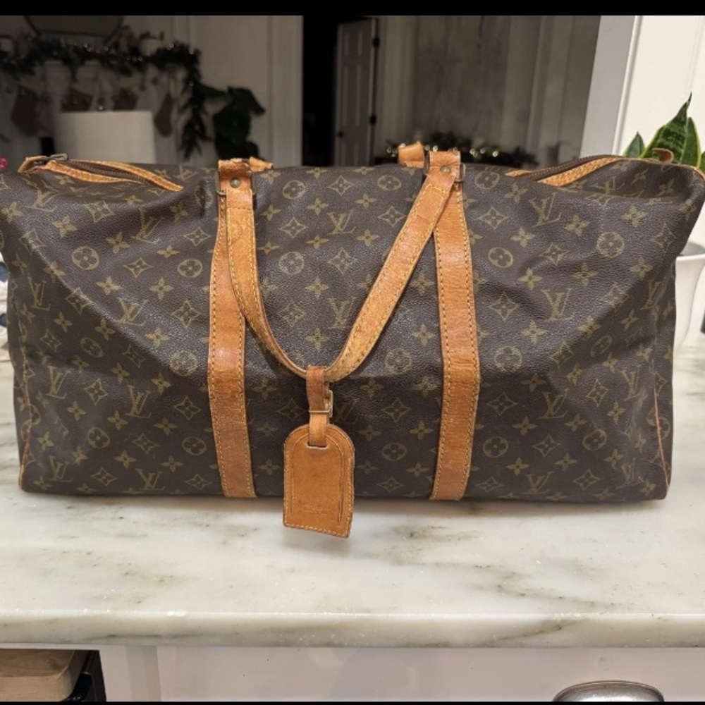 Sold Louis Vuitton Sac Souple 55 Leather Monogram Duffle REPAIR